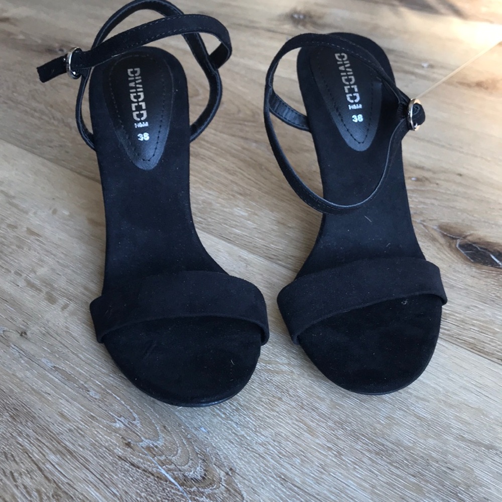 Black faux suede strappy sandal.